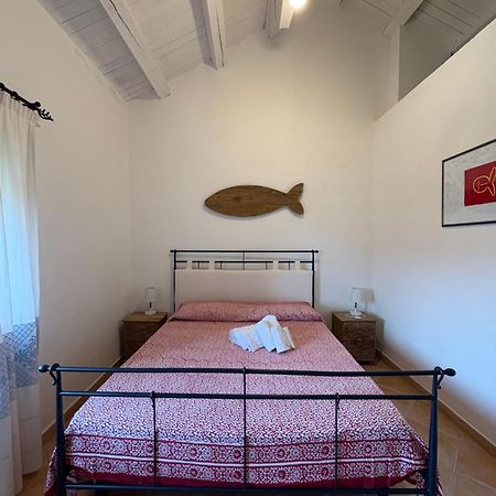 Appartamento Il Paguro A Cala Francese Ла-Маддалена Экстерьер фото